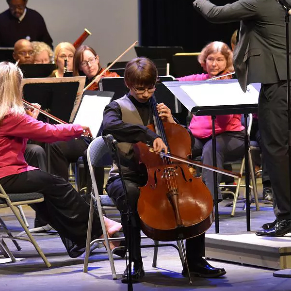 Andrew Bailey in concert playing his cello